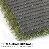Synthetic turf backing with holes. Riviera Monterey 50 ounces. Total Surface Drainage allows perfectly clean, dry surface.